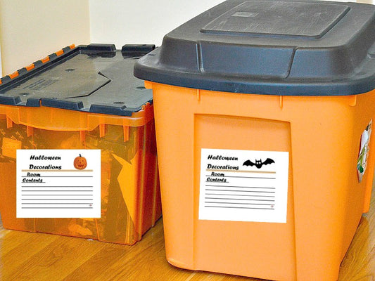 Two orange trash cans with Organized 31 Shop Halloween Decoration Labels.